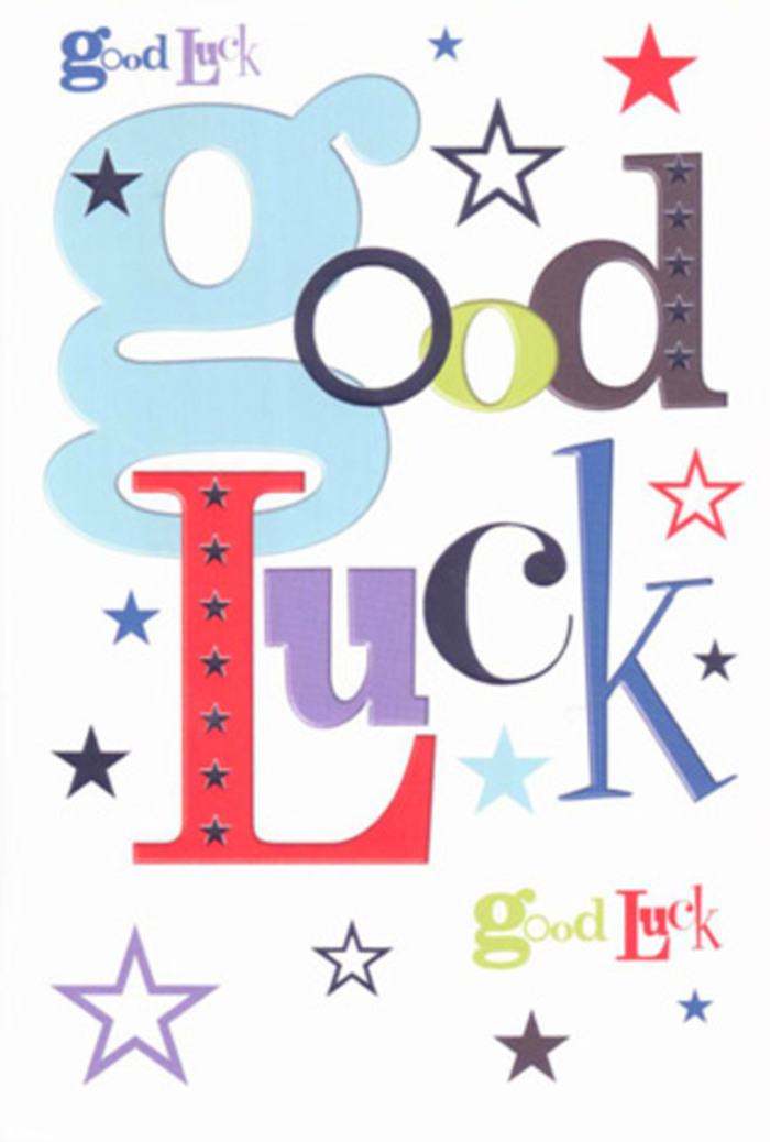 In this photograph, a stylish good luck card lies flat, filling the frame with a design that feels as upbeat and carefully composed as a hand-tied bouquet prepared for collection in Noak Hill. The main focus is the phrase Good Luck, written in a medley of fonts and colours that play off one another with cheerful ease. The first letter, a large baby-blue g, curls across the card in a soft, rounded shape, instantly creating an approachable, almost childlike charm. Beside and beneath it, other letters appear in rich shades of red, moss green, midnight black, deep purple, and cool-toned blues, each slightly different in thickness and style, yet working together like mixed seasonal stems in a single arrangement. Surrounding the text is a gentle constellation of stars, scattered generously across the snowy white background. Some stars are tiny ink-blue pinpricks, others broader splashes of indigo, sky-blue, or lavender, and a few are faint, ghostlike outlines, giving the impression of layers of wishful thoughts floating above the words. The composition feels light and uncluttered, with enough white space for each element to stand out, much like the way we space focal blooms and foliage so each petal can be appreciated. The card stock itself looks smooth, sturdy, and velvety to the touch, the kind you might find propped beside a vase of fresh flowers on a windowsill overlooking the green edges of Noak Hill Common. While there are no extra embellishments-no ribbons or glitter-the combination of colour and typography radiates a confident, heartfelt optimism, perfect for someone about to take a driving test in nearby Collier Row, start university, or open a new business. It feels like a quiet chorus of you've got this, ready to accompany a fresh bouquet on its journey through our local streets.